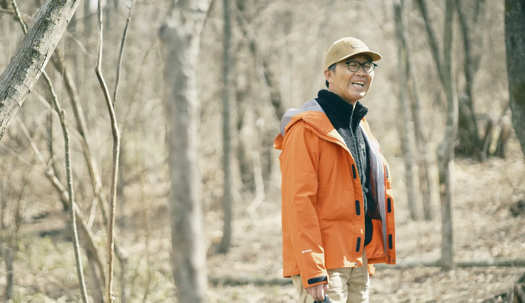 Mr. Honjo talking in the woods he cultivated himself